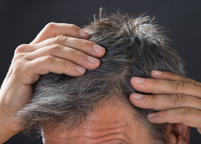 Man checking hair